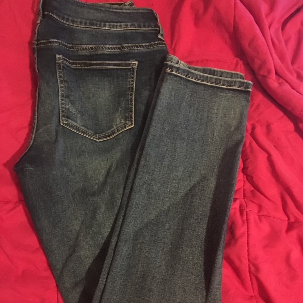 Medium wash destructed straight leg denim jeggings